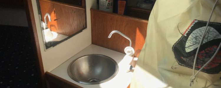 Head with sail on toilet